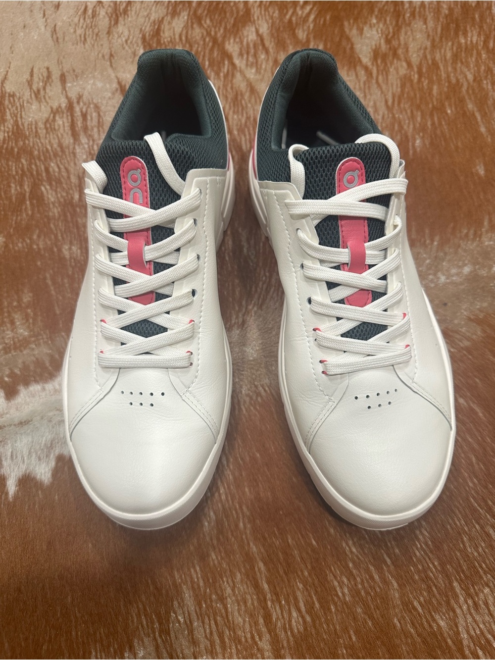 On Running White Sneakers with Pink Accents